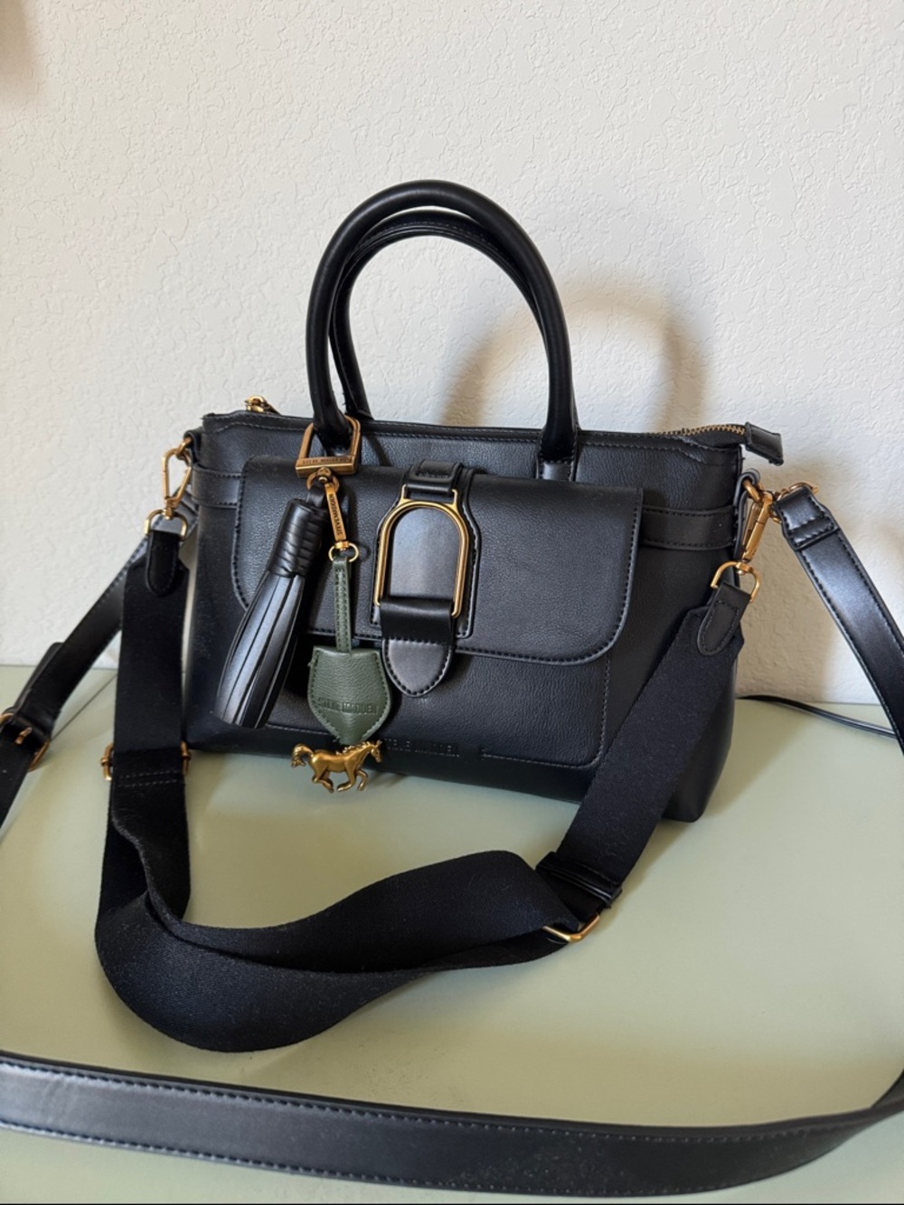Steve Madden Black Satchel with Gold Hardware and Green Charm